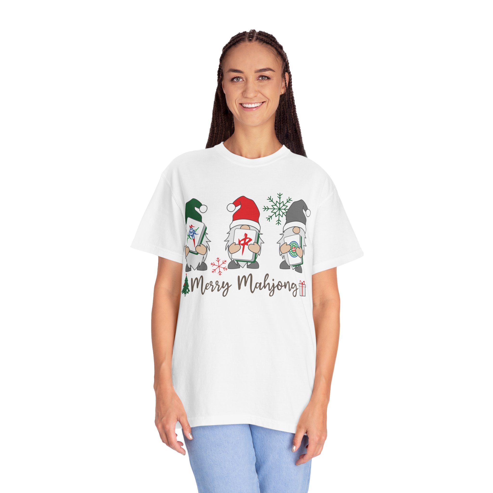Mahjong Baby Merry Mahjong Christmas T-shirt featuring three festive gnome characters holding mahjong tiles and gifts on a white holiday graphic tee.