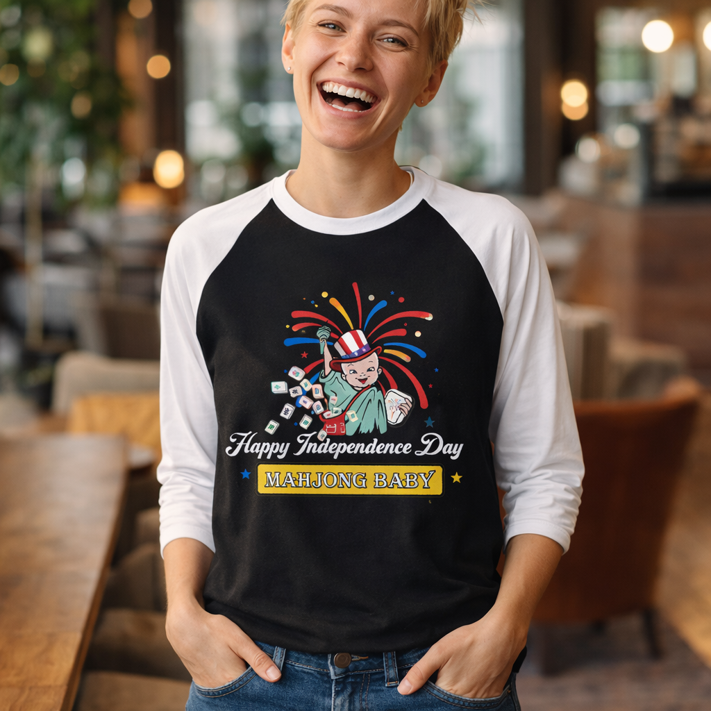 4th of July Mahjong Baby raglan shirt worn by woman, patriotic baseball tee with Liberty mahjong design in casual setting