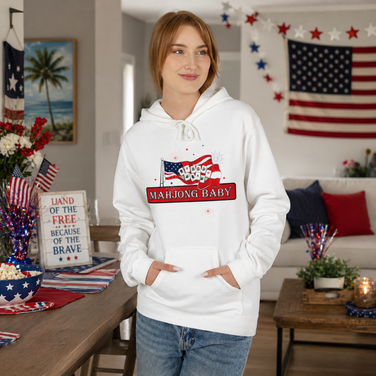 4th of July Mahjong Baby hoodie worn by woman, patriotic mahjong hoodie with Winning Is My Freedom design in home setting