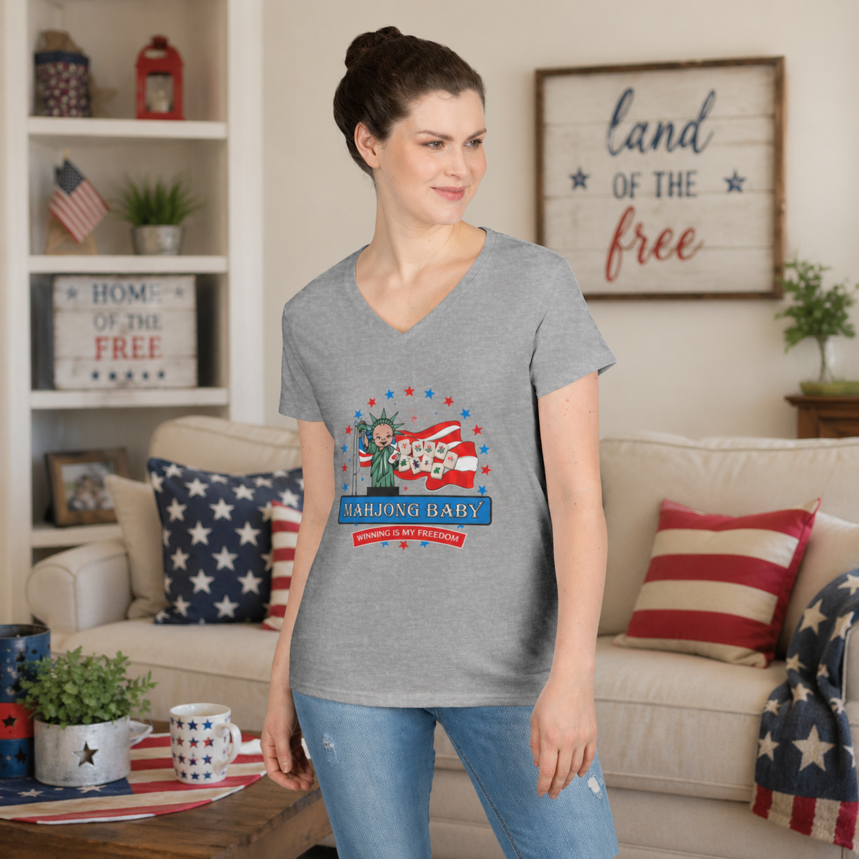 4th of July Mahjong Baby V-neck T-shirt worn by woman, patriotic mahjong tee with Winning Is My Freedom design in home setting