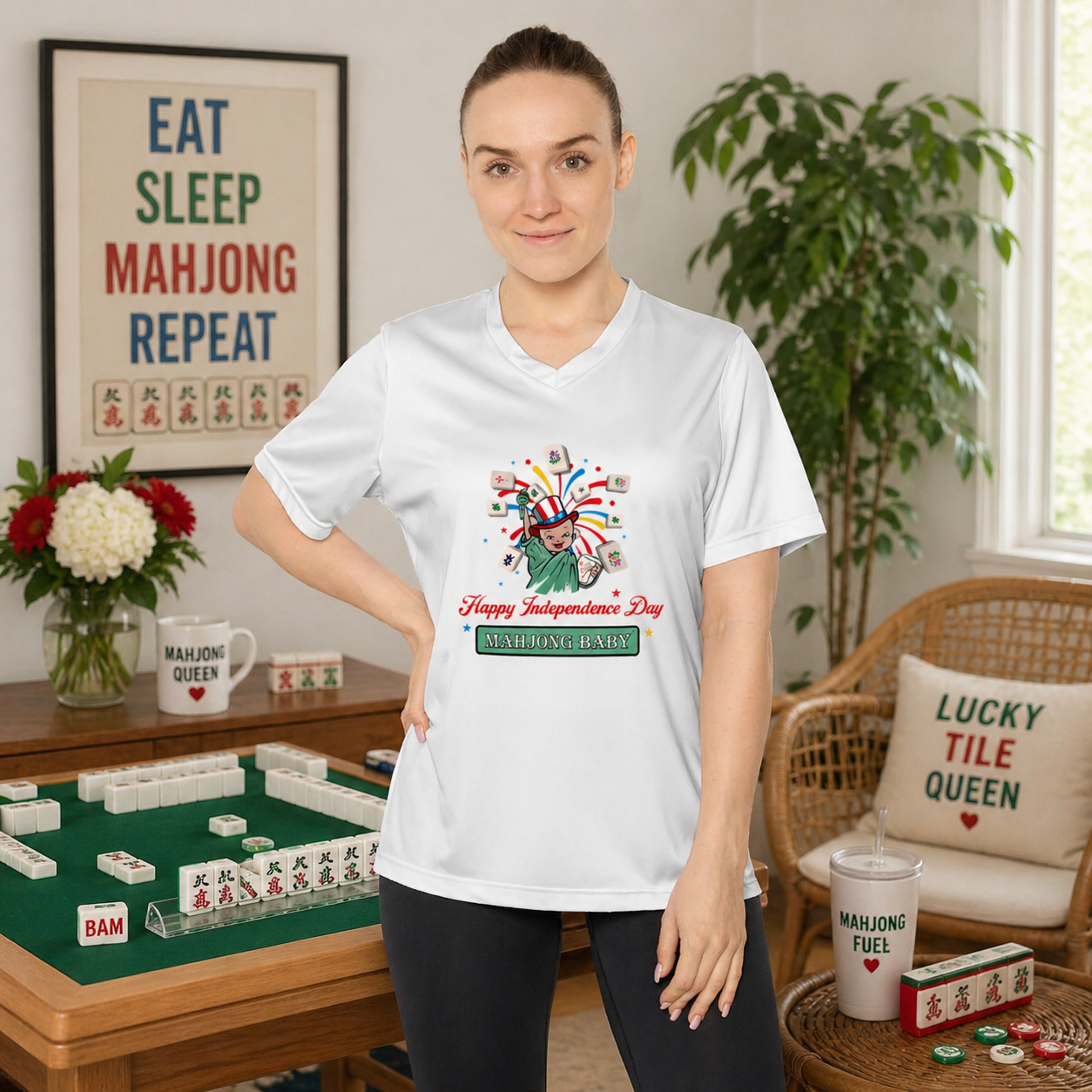 4th of July Mahjong Baby V-neck T-shirt worn by woman, patriotic UPF 40+ tee with Liberty mahjong design in home game room