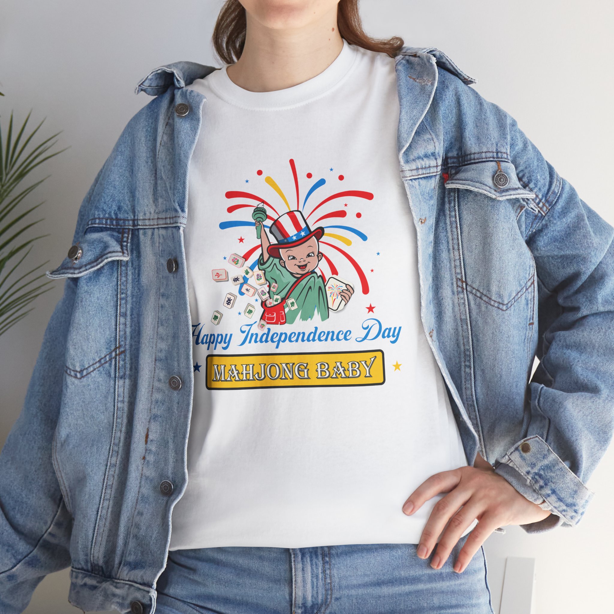woman wearing mahjong baby patriotic fireworks t shirt with Statue of Liberty mahjong design and fireworks graphic, 4th of July independence day outfit casual denim look